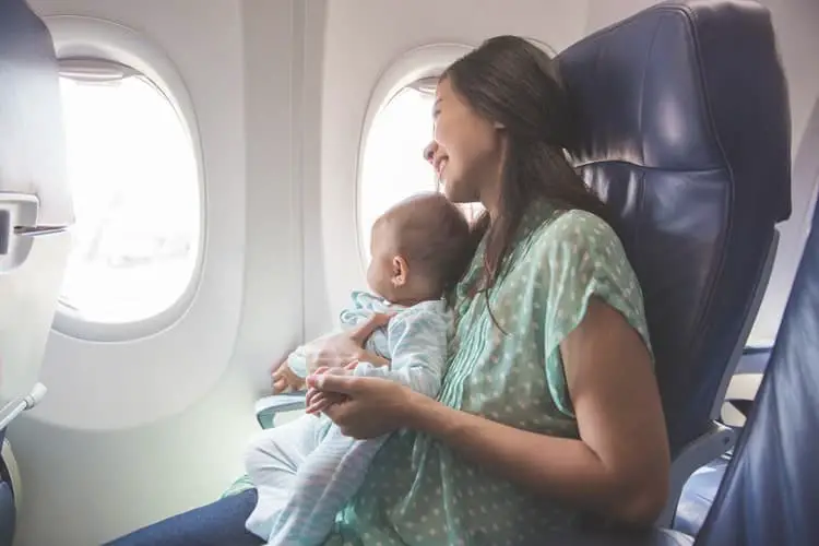 Mother with baby on a plane