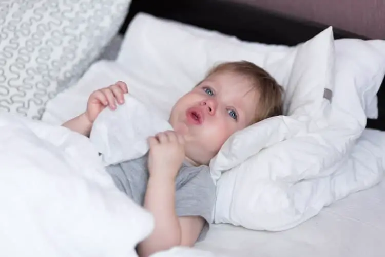 Toddler coughing in bed